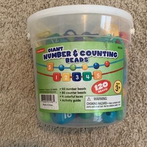 Lakeshore giant numbers and counting beads